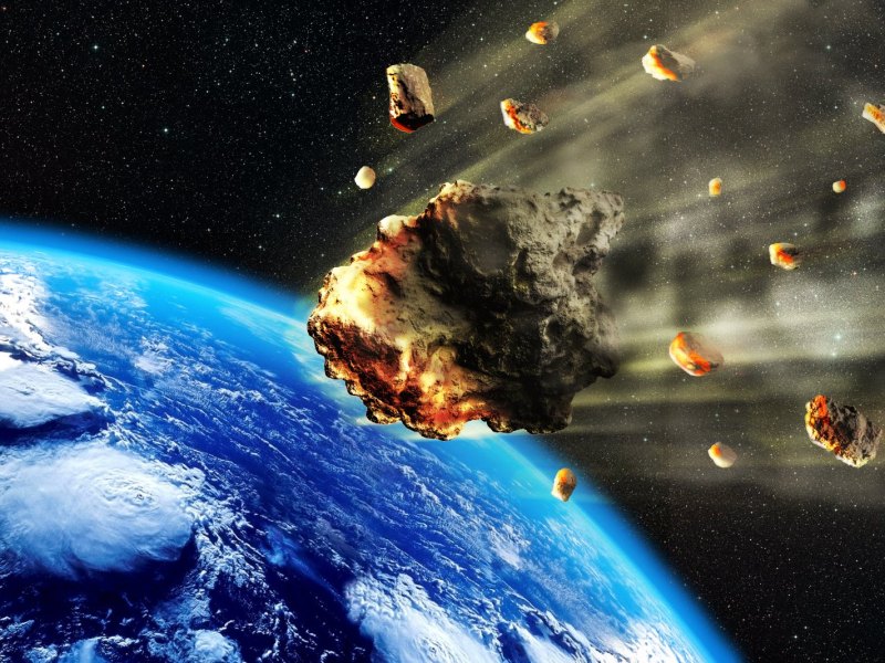 3D rendering of a swarm of Meteorites or asteroids entering the Earth atmosphere. - Illustration