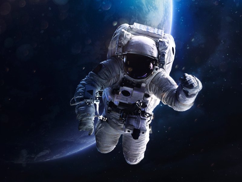 Astronaut im Universum