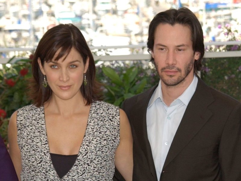 Keanu Reeves mit Carrie-Anne Moss in Cannes.. © Paul Smith/Featureflash/ImageCollect