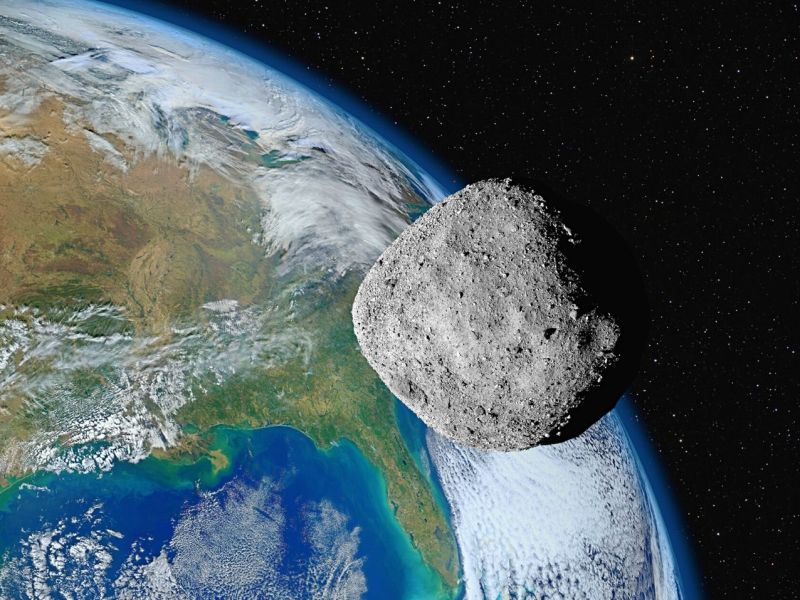 Asteroid über der Erde