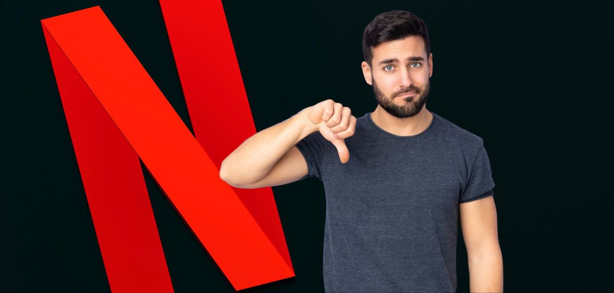 netflix und mann zeigt daumen runter