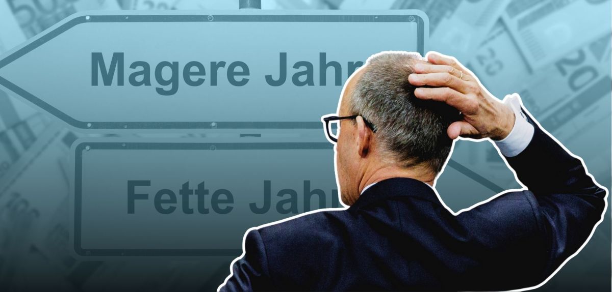 Friedrich Merz (CDU) vor einem Schild mit der Aufschrift 