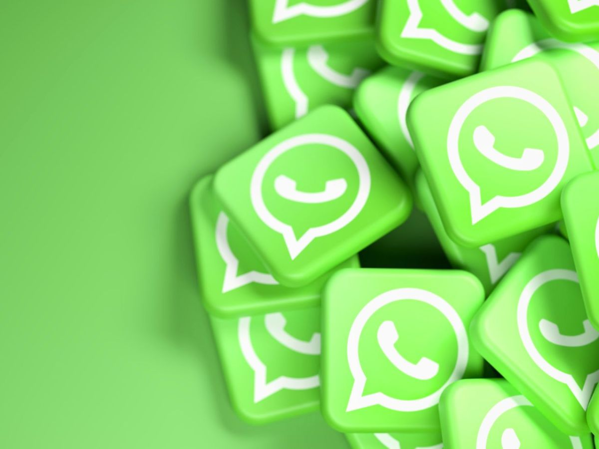 WhatsApp-Symbole in mehreren grünen Kacheln.